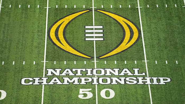 The national championship logo on the field