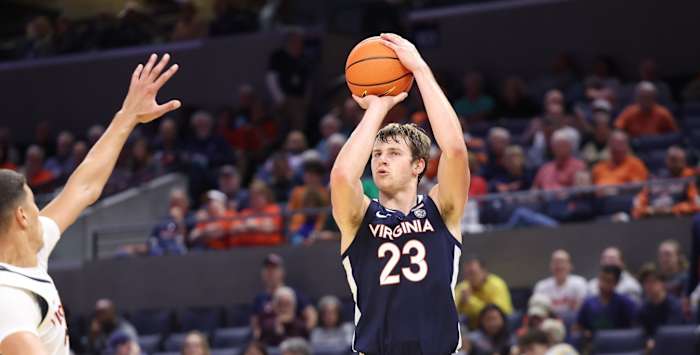 Freshman forward Isaac Traudt shoots a three-pointer during the Virginia men's basketball Blue-White Scrimmage at John Paul Jones Arena.