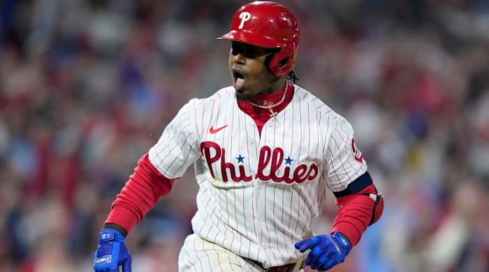 Phillies second baseman Jean Segura celebrates after hitting a go-ahead two-run single against the Padres in Game 3 of the NLCS.