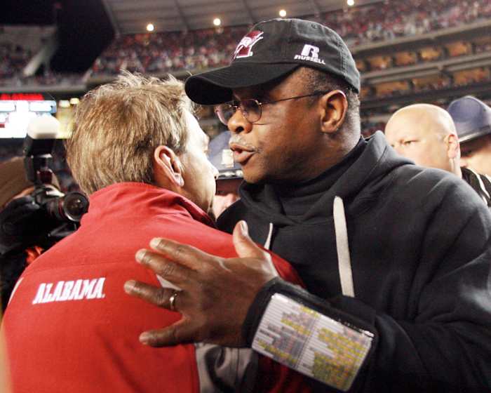 Mississippi Coach Sylvester Croom congratulates Alabama Crimson Tide head coach Nick Saban at Bryant Denny Stadium. The Tide defeated the Bulldogs 32-7. Mandatory Credit: