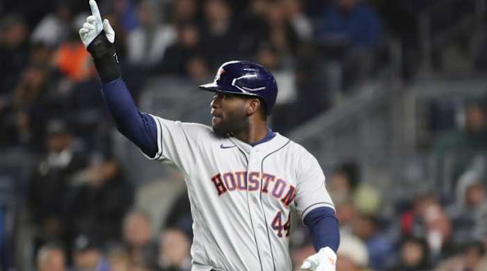 Astros DH Yordan Alvarez celebrates scoring a run in Game 5 of the 2022 NLCS.