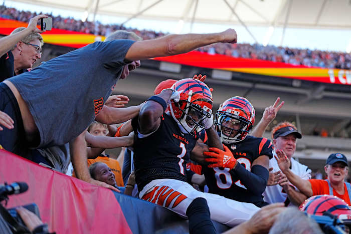 Cincinnati Bengals wide receiver Ja'Marr Chase (1) celebrates in the stands after a touchdown reception in the second quarter of the NFL Week 7 game between the Cincinnati Bengals and the Atlanta Falcons at Paycor Stadium in downtown Cincinnati on Sunday, Oct. 23, 2022. The Bengals led 28-17 at halftime. Mandatory Credit: Sam Greene-The Enquirer Atlanta Falcons At Cincinnati Bengals Nfl Week 7
