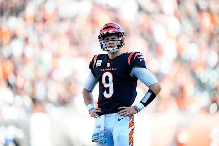 Cincinnati Bengals quarterback Joe Burrow (9) watches an official review on the big screen in the fourth quarter of the NFL Week 7 game between the Cincinnati Bengals and the Atlanta Falcons at Paycor Stadium in downtown Cincinnati on Sunday, Oct. 23, 2022. The Bengals won 35-17.