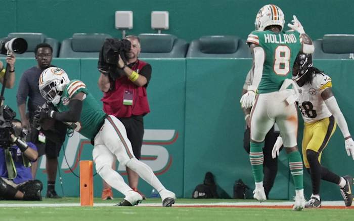 Dolphins cornerback Noah Igbinoghene (9) intercepts a pass late in the game against the Pittsburgh Steelers in Week 7.