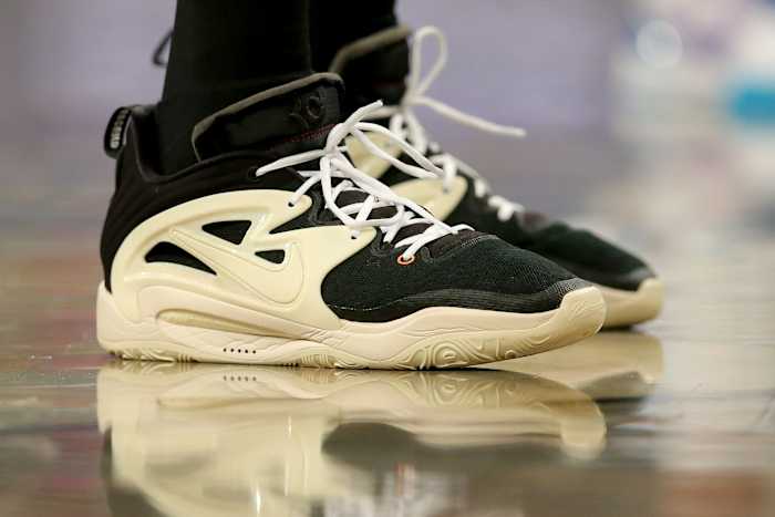 Black and sail Nike KD shoes.