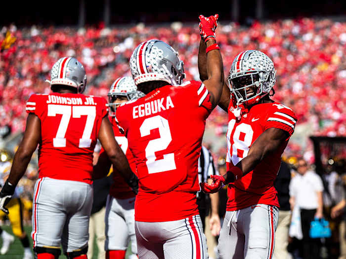 Ohio State’s Marvin Harrison Jr. and Emeka Egbuka celebrate