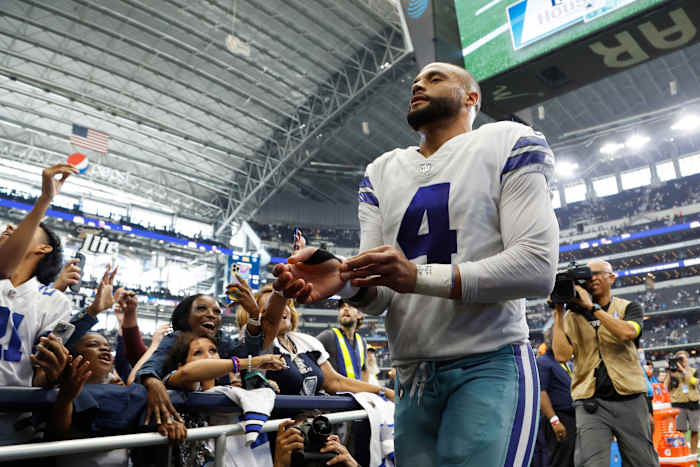 Dallas Cowboys quarterback Dak Prescott (4) leaves the field after the game against the Detroit Lions at AT&T Stadium.