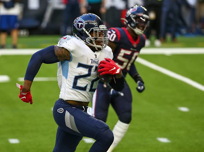 Tennessee Titans running back Derrick Henry breaks off a big run against the Houston Texans.