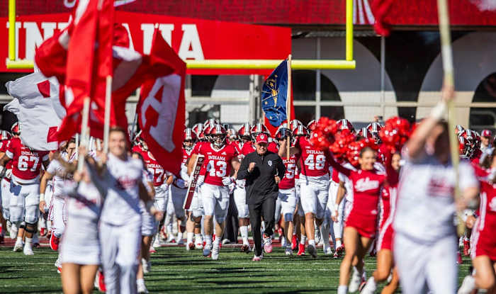 Indiana's Tom Allen leads the Hoosiers onto the field the Indiana versus Maryland football game at Memorial Stadium on Saturday, Oct. 15, 2022.