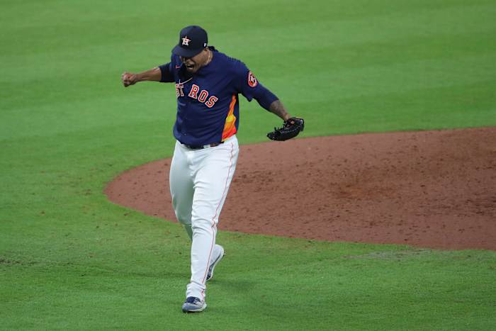 Astros pitcher Bryan Abreu yells in celebration