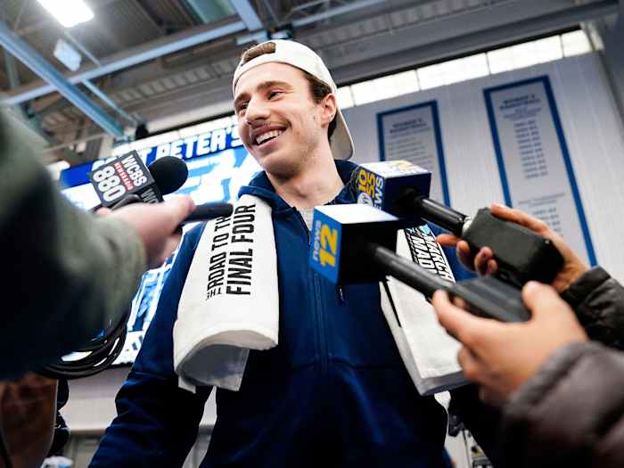 Saint Peter’s Doug Edert speaks to media in March