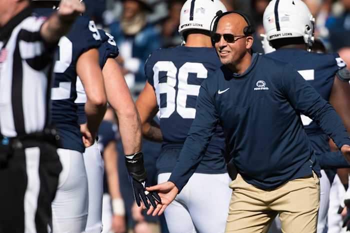 Penn State head coach James Franklin high-fives his players after the Nittany Lions scored a touchdown in the second quarter against Ohio State at Beaver Stadium on Saturday, Oct. 29, 2022, in State College. The Nittany Lions fell to the Buckeyes, 44-31.