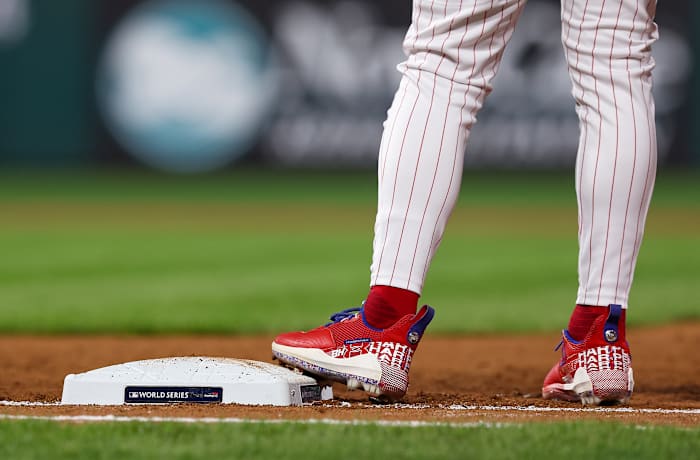 View of Bryce Harper's cleats as he stands on first base.