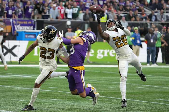 Oct 2, 2022; New Orleans Saints defensive backs P.J. Williams (26) and Marshon Lattimore (23) defend against Minnesota Vikings receiver Adam Thielen (19). Mandatory Credit: Kirby Lee-USA TODAY Sports