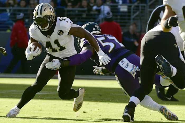 Oct 21, 2018; New Orleans Saints running back Alvin Kamara (41) runs through a Baltimore Ravens tackle attempt. Mandatory Credit: Tommy Gilligan-USA TODAY Sports