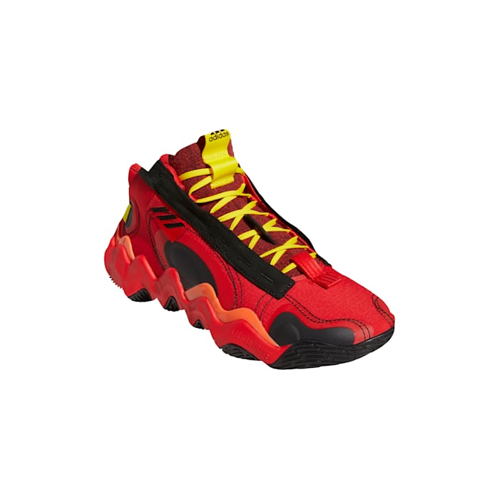 Red, black, and yellow Adidas shoes.