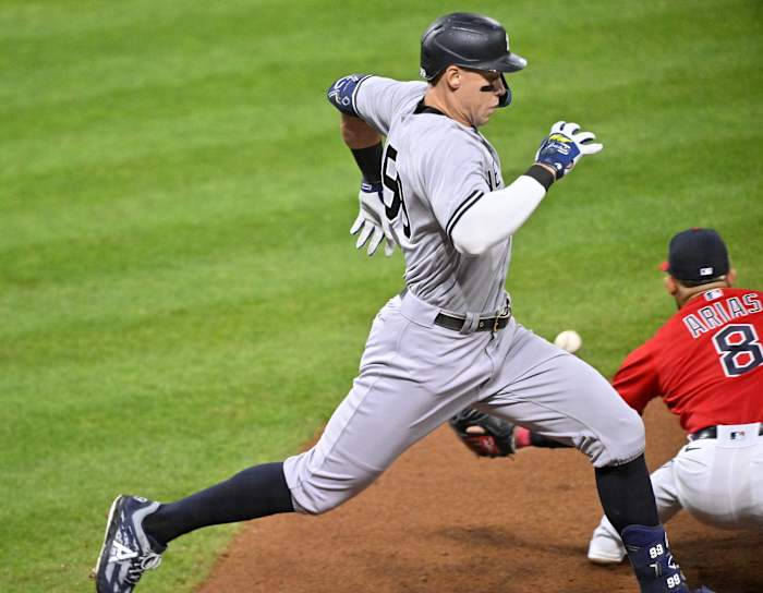 Aaron Judge races towards first base to secure a hit