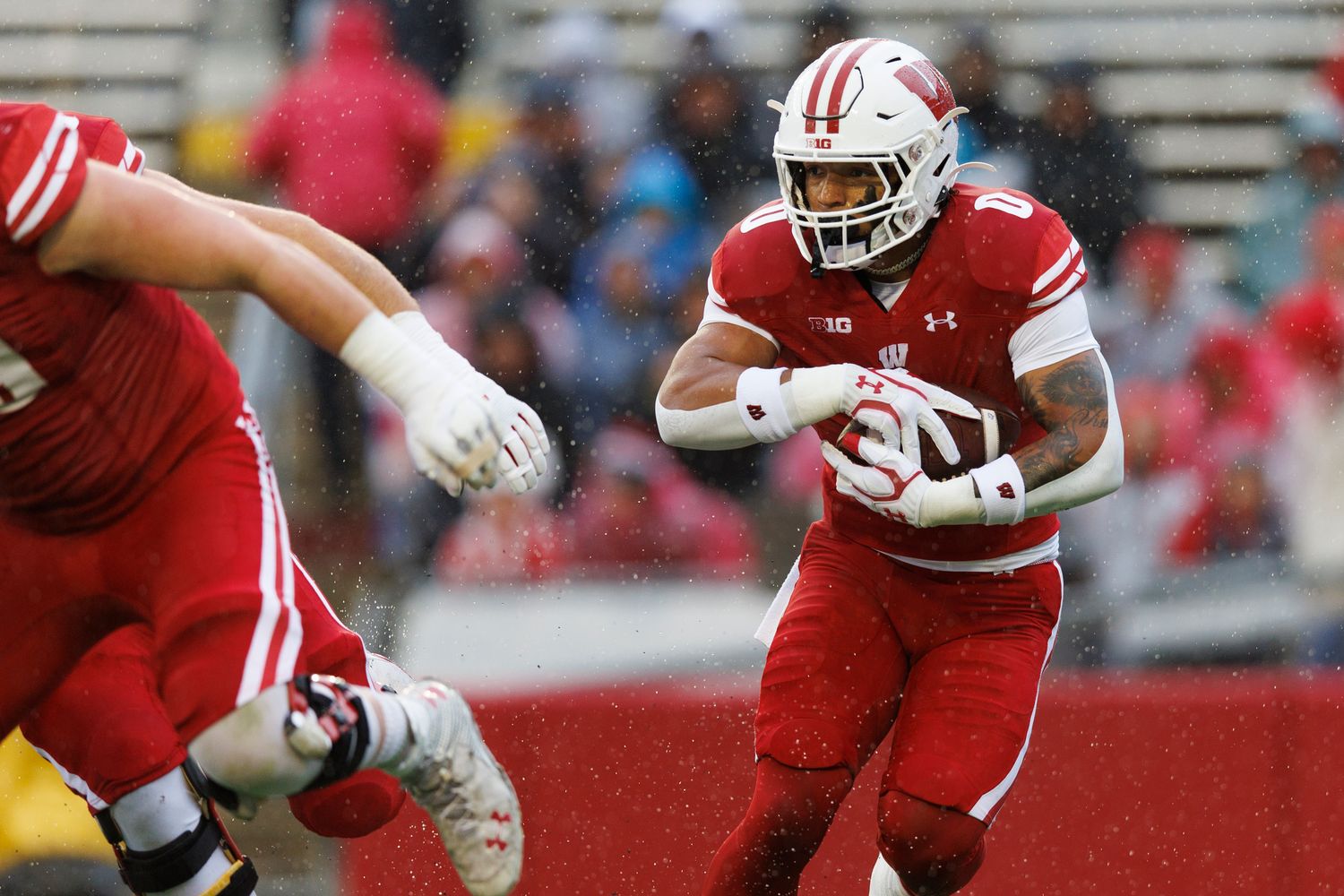 Wisconsin running back Braelon Allen carrying the football against Maryland at Camp Randall Stadium.