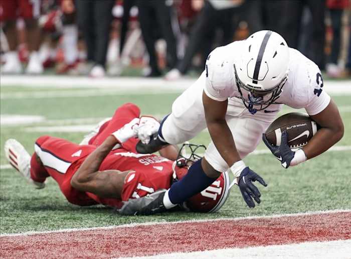 Penn State Nittany Lions running back Kaytron Allen (13) runs for a touchdown past Indiana Hoosiers defensive back Jonathan Haynes (17) during the first half at Memorial Stadium.