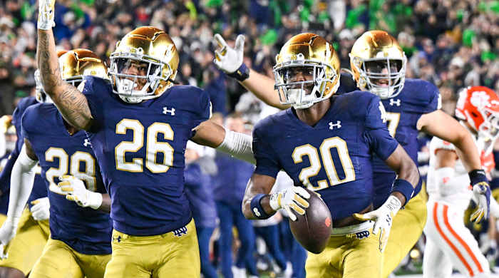 Notre Dame celebrates an interception.