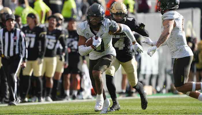 Cornerback Christian Gonzalez snags one of two interceptions against Colorado in week 10.