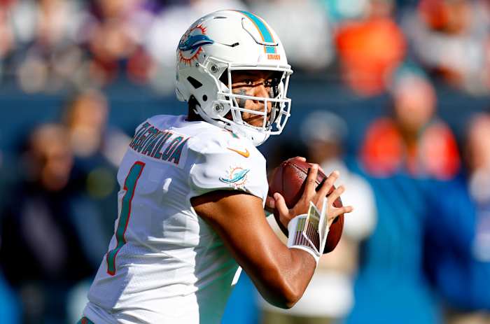 Miami Dolphins quarterback Tua Tagovailoa (1) drops back to pass against the Chicago Bears during the second half at Soldier Field.