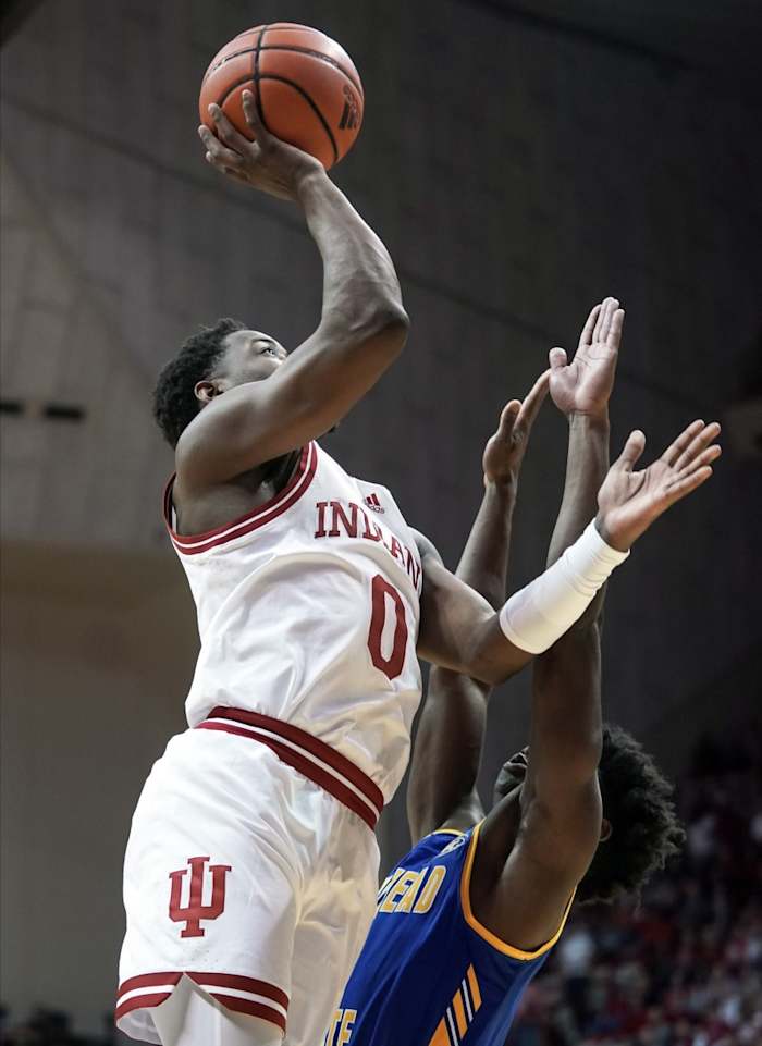 Nov 7, 2022; Bloomington, Indiana, USA; Indiana Hoosiers guard Xavier Johnson (0) makes a shot over Morehead State Eagles guard Drew Thelwell (3) during the first half at Simon Skjodt Assembly Hall.