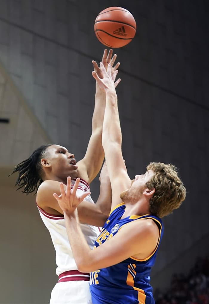 Nov 7, 2022; Bloomington, Indiana, USA; Indiana Hoosiers forward Malik Reneau (5) attempts a shot over Morehead State Eagles forward Alex Gross (45) during the first half at Simon Skjodt Assembly Hall.