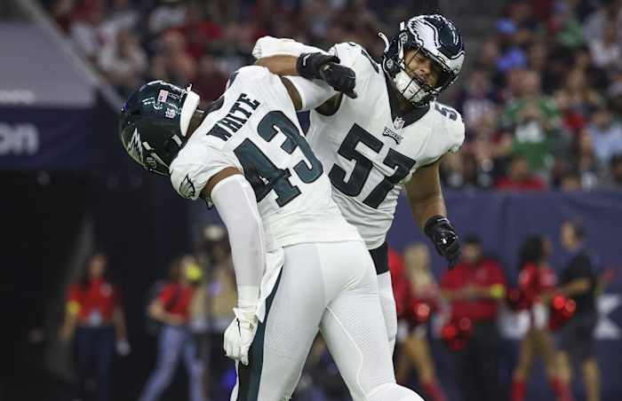 Kyzir White and T.J. Edwards