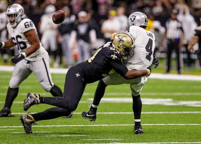 New Orleans Saints defensive end Cameron Jordan (94) hits Las Vegas Raiders quarterback Derek Carr (4) as he throws. Mandatory Credit: Stephen Lew-USA TODAY Sports