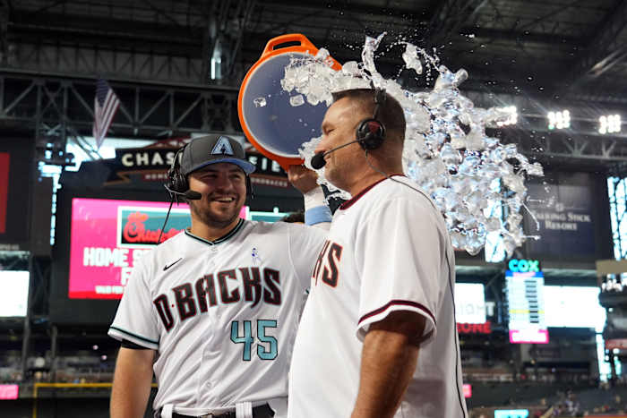 Buddy Kennedy watches his father get ice bucket shower