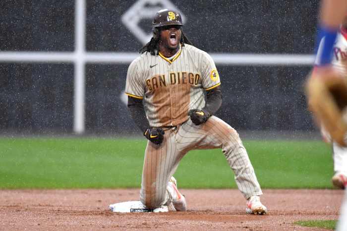 Bell slides safely into second after plating the tying run in Game 5 of the NLCS.