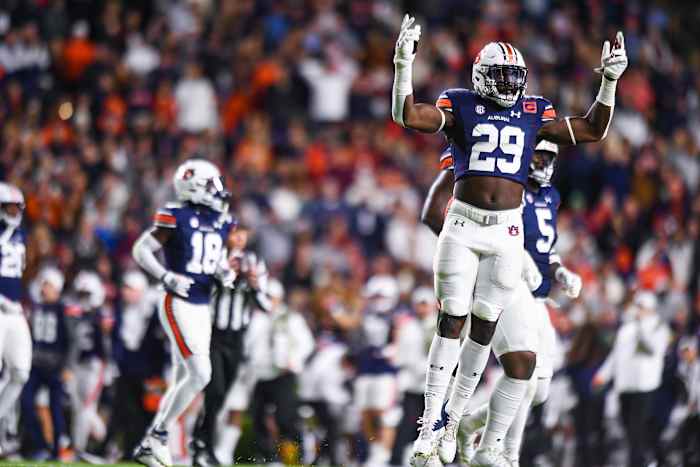 Derick Hall (29) pumps up the crowd during the game between Auburn and Texas A&M at Jordan-Hare Stadium. Grayson Belanger/AU Athletics