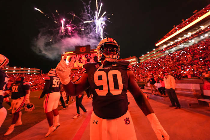 Enyce Sledge (90) walking out into the fourth quarter during the football game between the Texas A&M Aggies and the Auburn Tigers at Jordan Hare Stadium in Auburn, AL on Saturday, Nov 12, 2022. Austin/Auburn Tigers generic