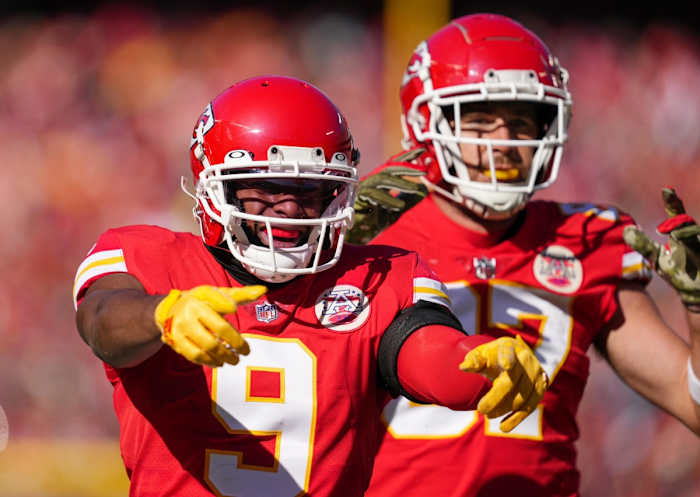 Nov 13, 2022; Kansas City, Missouri, USA; Kansas City Chiefs wide receiver JuJu Smith-Schuster (9) celebrates alongside tight end Travis Kelce (87) during the first half against the Jacksonville Jaguars at GEHA Field at Arrowhead Stadium. Mandatory Credit: Jay Biggerstaff-USA TODAY Sports