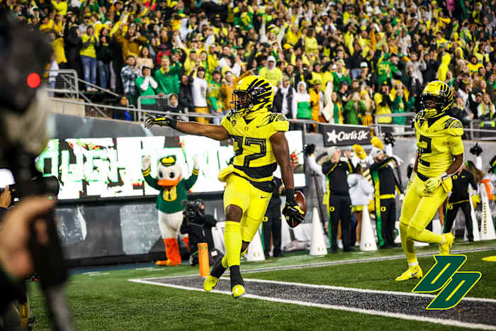 Oregon Ducks running back Noah Whittington celebrates a touchdown against the Washington Huskies.