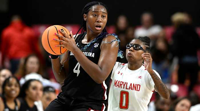 South Carolina’s Aliyah Boston looks to pass as Maryland’s Shyanne Sellers defends.