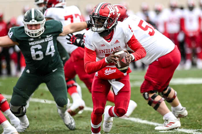 Indiana's Dexter Williams II looks to throw against Michigan State during the third quarter on Saturday, Nov. 19, 2022 at Spartan Stadium in East Lansing.