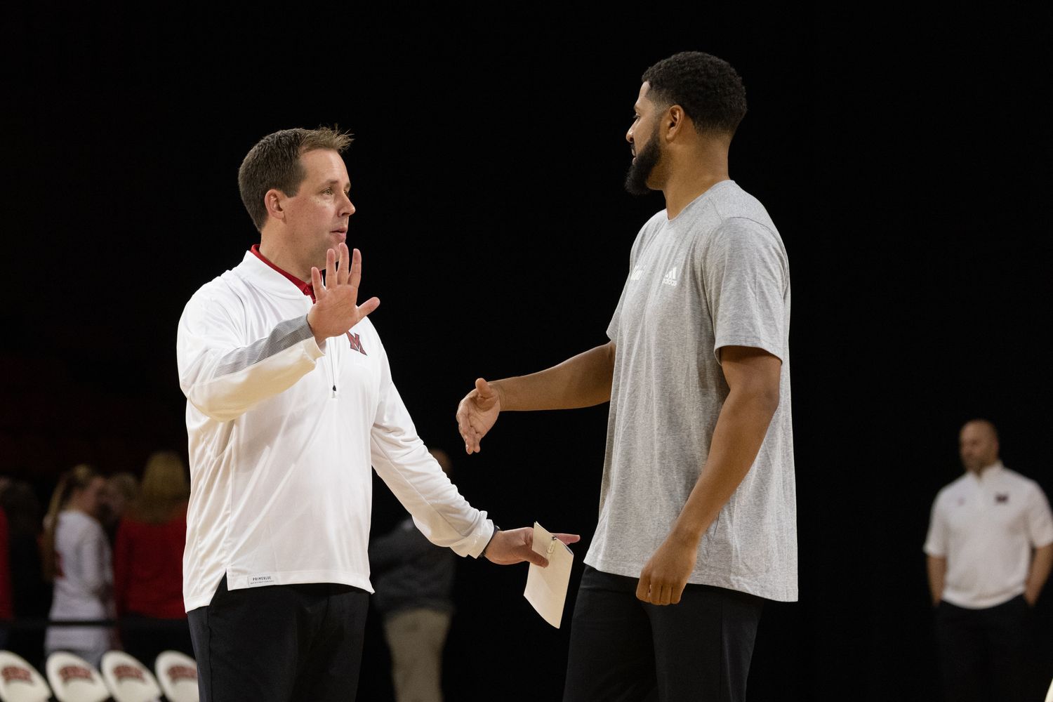 Bloomington South graduate Jonathan Holmes (left) is in his first year as an assistant coach for Miami of Ohio basketball.