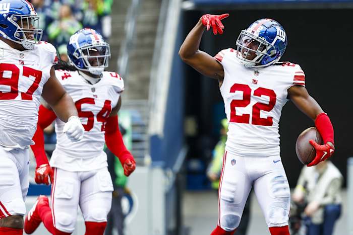 Oct 30, 2022; Seattle, Washington, USA; New York Giants cornerback Adoree Jackson (22) celebrates following a fumble recovery against the Seattle Seahawks during the second quarter at Lumen Field. New York Giants defensive tackle Dexter Lawrence (97) joins Jackson at left.