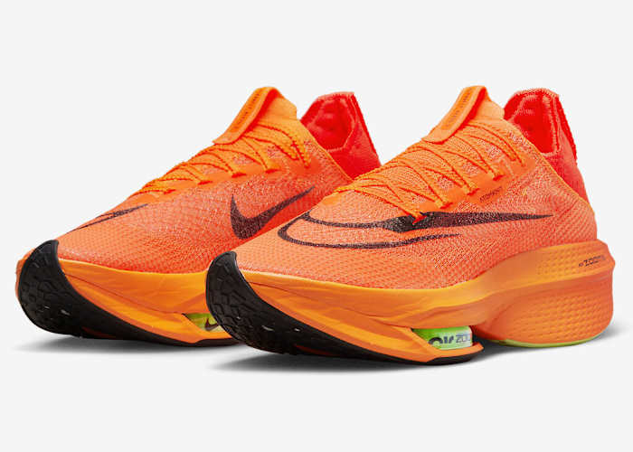 Orange Nike running shoes.