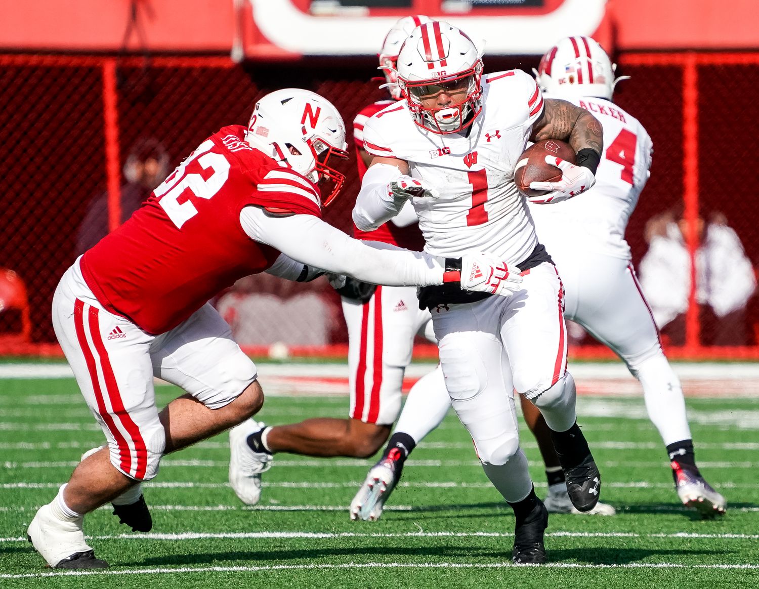 Wisconsin running back Chez Mellusi carrying the football against Nebraska.