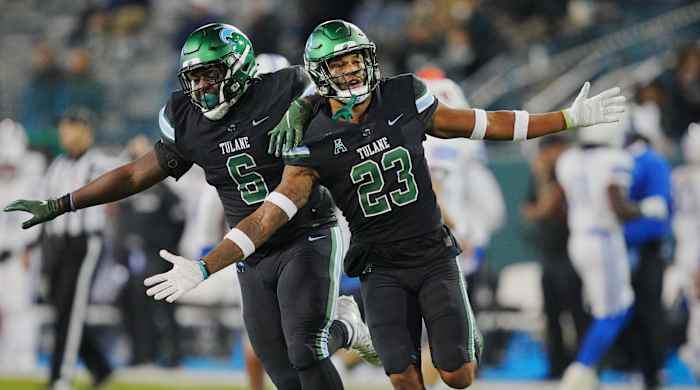 Tulane safety Lummie Young IV celebrates an interception