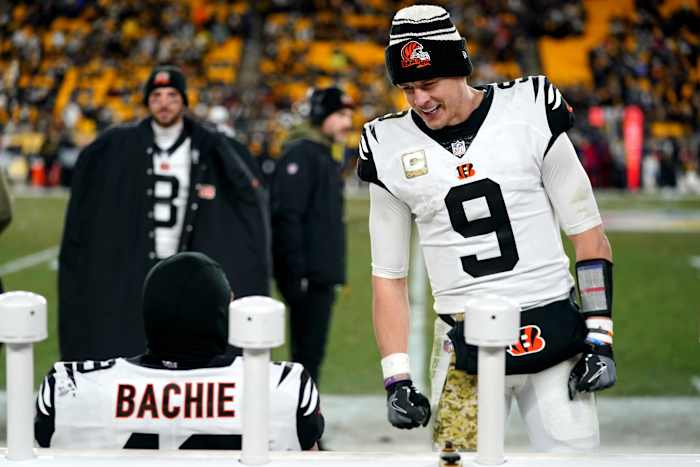 Cincinnati Bengals quarterback Joe Burrow (9) jokes with Cincinnati Bengals Cincinnati Bengals linebacker Joe Bachie in the fourth quarter during a Week 11 NFL game against the Pittsburgh Steelers, Sunday, Nov. 20, 2022, at Acrisure Stadium in Pittsburgh, Pa. The Cincinnati Bengals won, 37-30. Nfl Cincinnati Bengals At Pittsburgh Steelers Nov 20 0346