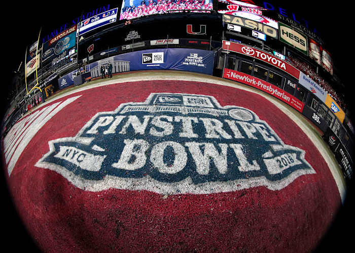 The Pinstripe Bowl logo shown after the Badgers beat Miami