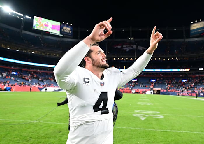 Raiders quarterback Derek Carr celebrates after his team's overtime win against the Broncos in Week 11.
