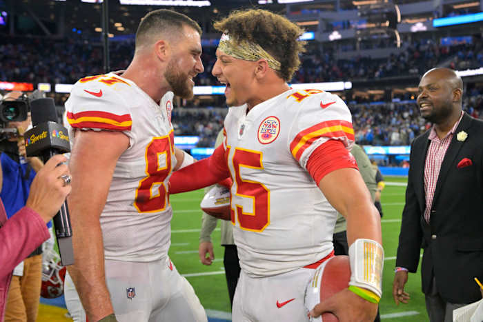 Kansas City Chiefs tight end Travis Kelce, left, and quarterback Patrick Mahomes celebrate after the Chiefs defeated the Los Angeles Chargers 30-27 in an NFL football game Sunday, Nov. 20, 2022, in Inglewood, Calif.