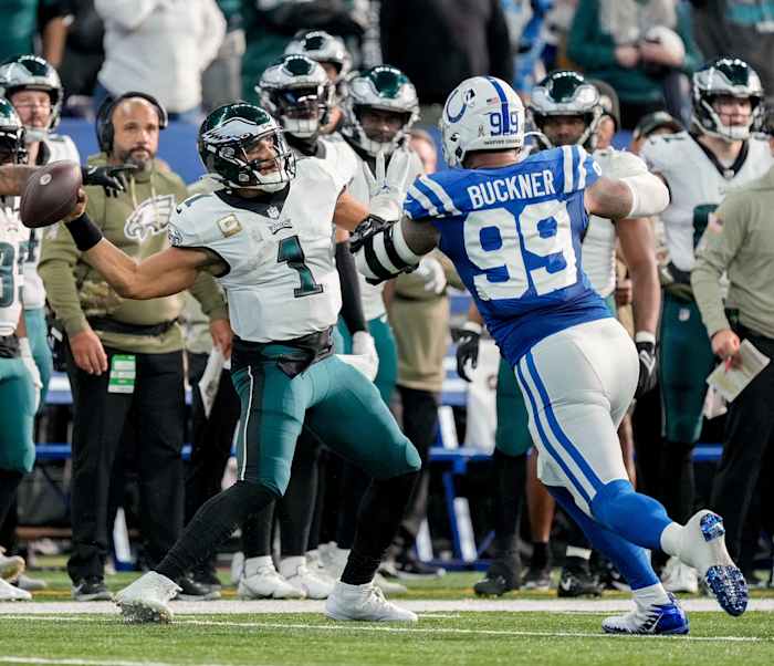 Indianapolis Colts defensive tackle DeForest Buckner (99) pressures Philadelphia Eagles quarterback Jalen Hurts (1) on a fourth down play Sunday, Nov. 20, 2022, during a game against the Philadelphia Eagles at Lucas Oil Stadium in Indianapolis.