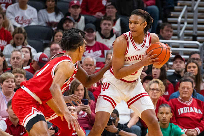 Indiana Hoosiers forward Malik Reneau (5) dribbles the ball while Miami (Oh) Redhawks guard Bryson Tatum (4) defends in the first half at Gainbridge Fieldhouse.