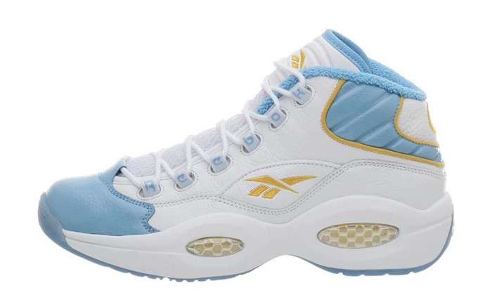 White and blue Reebok shoe.